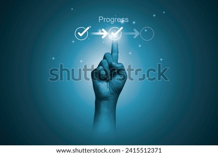 Hand touching to tick correct mark in checklist with progressive loading status to remind work task progressive for project develop management and tracking concept. 