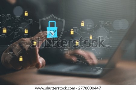 Hand touching virtual security shield with lock icons and connected network, representing cybersecurity protection, data encryption, privacy, secure access, and digital network defense.