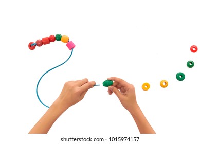 Hand With Toy Show That Playing Activity Promote Development, Thinking, Fine Hand Using Skill, Coordination And Visual Perception