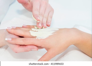 Hand Treatment With Mask In Beauty Salon