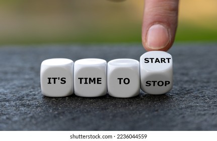 Hand turn dice and changes the expression 'it's time to stop' to 'it's time to start'.