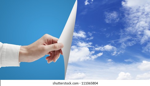 Hand Turn Page To Blue Sky