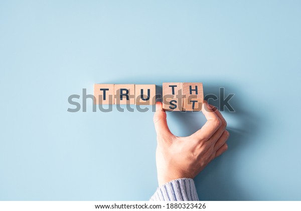 Hand turned wood cube and changes the word\
\
