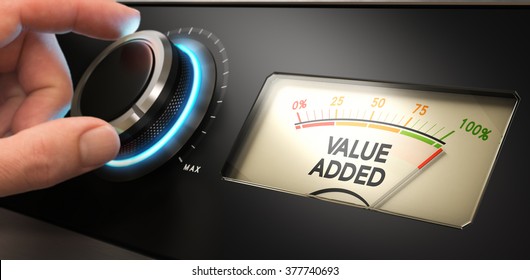 Hand turning a knob up to the maximum with a dial where it is written the text value added. Concept image for illustration of competitive advantage. - Shutterstock ID 377740693