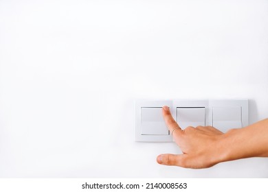 Hand Turning Off Or Turning On The Light