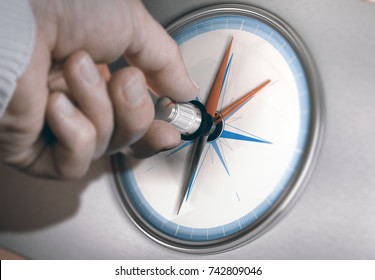 Hand Turning An Orientation Knob On A Compass To Change Course. Concept Of Career Shift. Composite Image Between A Hand Photography And A 3D Background.