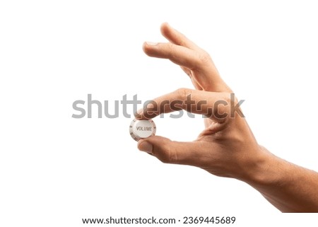 Hand turning volume control knob isolated no background