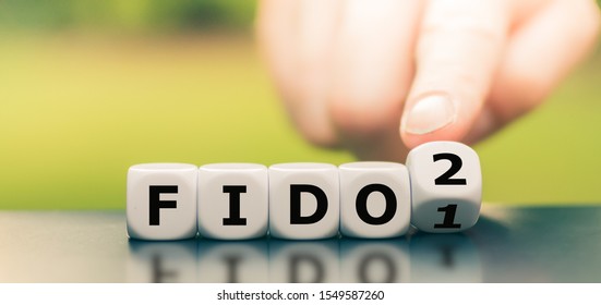 Hand turns a dice and changes the expression 