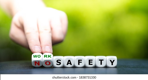 Hand turns dice and changes the expression "no safety" to "work safety". - Shutterstock ID 1838731330