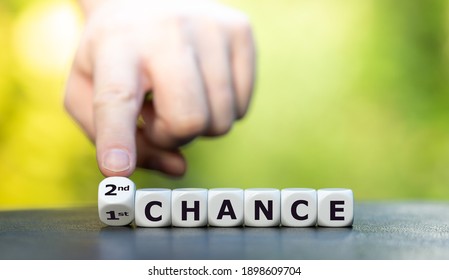 Hand turns dice and changes the expression "1st chance" to "2nd chance".