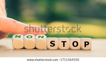 Hand turns dice and changes the expression 