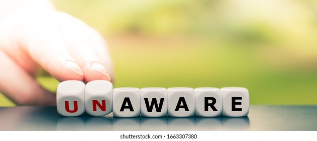 Hand turns dice and changes the word 