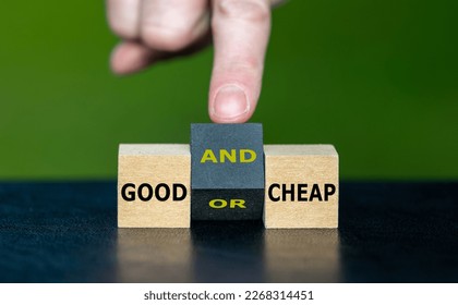 Hand turns wooden cube and changes the expression 'good or cheap' to 'good and cheap'.