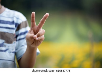 Hand With Two Fingers Up In The Peace Or Victory Symbol