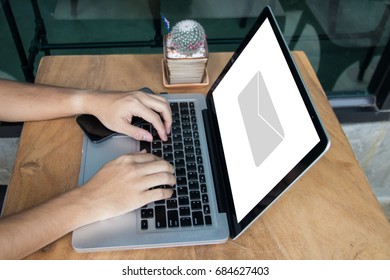 Hand Typing Keyboard On Laptop To Send Email. Business Concept