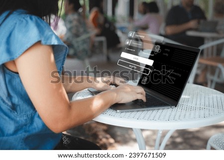 Hand typing on keyboard laptop to login register username and password identity on virtual screen from internet security access in cafe. Internet access, join social, personal data protection concept.