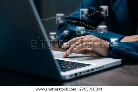 Hand typing on laptop with floating data flow nodes, representing database system, information network, cloud computing, digital connectivity, and structured data management.