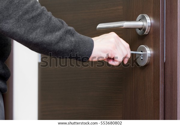 Hand Unlock House Door Stock Photo Edit Now 553680802