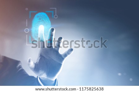 Hand of unrecognizable businessman in suit standing in blurred office and touching glowing dactylogram interface. Id and authentication concept. Toned image double exposure copy space