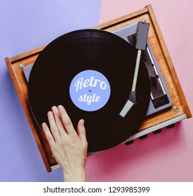 Hand Uses Retro Style Vinyl Player, DJ, Minimalism, Top View
