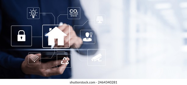 Hand using AI smart tablet with smart home app on the room, circular interface of the smart home automation assistant on the virtual screen and user touches the button, smart home digital interface  - Powered by Shutterstock