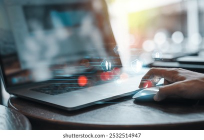 Hand using a computer mouse near a laptop, with digital security icons and network symbols representing cybersecurity concepts. - Powered by Shutterstock