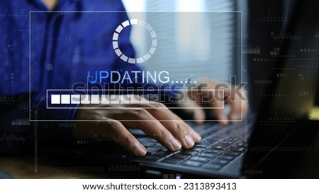 The hand is using the computer and the programs or software are being updated in order to use it effectively and always up to date.