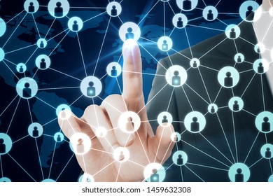 Hand using creative social network interface on dark background. Media, HR and communication concept. Multiexposure