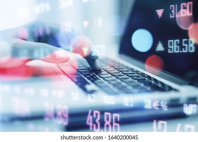 Hand using digital note pad with abstract stock data hologram. Analytics and trade concept. Close up - Powered by Shutterstock - Get 15% off with code: PIKWIZARD15