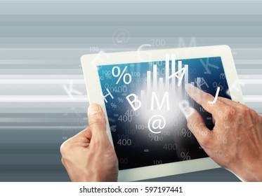 Hand using digital tablet.