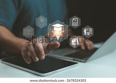Hand using digital tablet with education icons, online learning technology, e-learning platform, knowledge innovation, smart study concept for modern digital education and professional development.