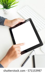 Hand Using Digital Tablet On Desk Vertical View