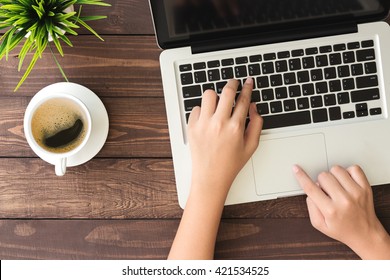 Hand Using Laptop Computer On Top View