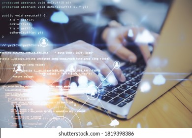 Hand Using Laptop On Desktop With Human Resources Hologram On Creative Glowing Programming Backdrop. Software And Hr Concept.