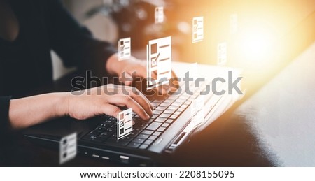 Hand using laptop and touch folder of document Management System, online documentation database and process automation to efficiently manage files work, knowledge, Corporate business technology,