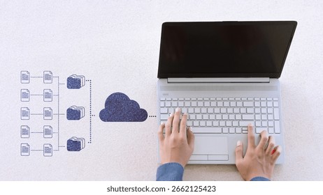 Hand using laptop uploading data to cloud storage, online database management, file sharing, and cloud computing technology for digital business and remote work.