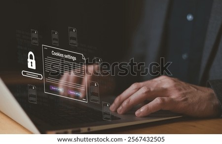 hand using laptop while choose to accept internet cookies policy or reject. Customer data privacy concept that allow web browser to collect user data to resell or use for marketing purpose.