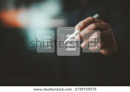 Hand using a pen to interact with digital checklist icons representing task and productivity management.
