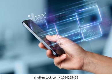 Hand using  phone with database reports and online work concept - Shutterstock ID 1084265453