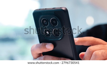 Hand Using Premium Smartphone for Mobile Apps and Connectivity
