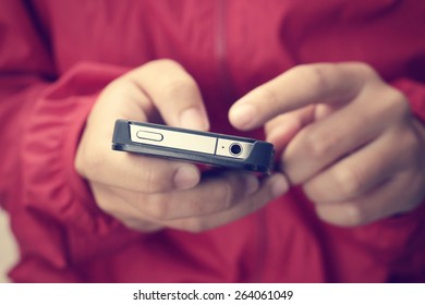 Hand using smart phone