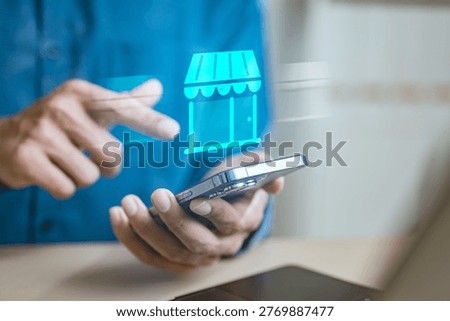 Hand using smartphone with digital store icon interface, representing online shopping, price comparison, and ecommerce deals. Concept of mobile marketplace, consumer purchase decision.
