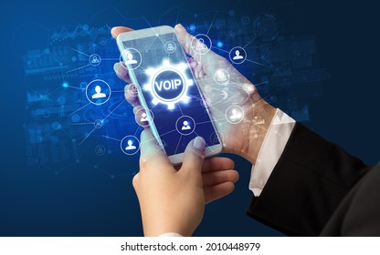 Hand using smartphone with technology concept