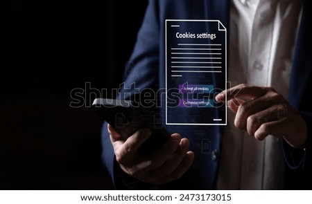hand using smartphone while choose to accept internet cookies policy or reject. Customer data privacy concept that allow web browser to collect user data to resell or use for marketing purpose.