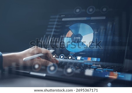 Hand using a stylus to interact with digital pie charts and analytics on a laptop, symbolizing marketing funnel performance, CRM data, and conversion insights for business growth.