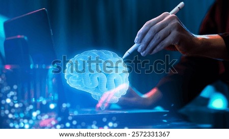 Hand using stylus to interact with glowing holographic brain model, representing neuroscience research and technological innovation. Concept of medicine, futurism, advanced technology, science, health