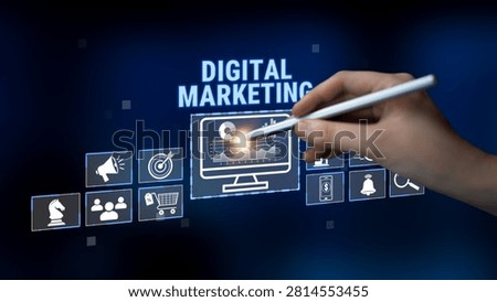 Hand Using Stylus on Touchscreen Display with Digital Marketing Symbols and Graphs Representing Online Business Growth and Strategy Concepts Quark.