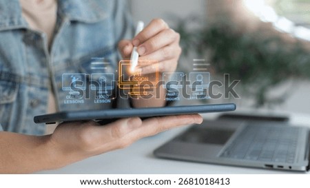 Hand using a tablet with an AI learning interface, online lessons, e-learning platform, video courses, digital education technology, online certification, and smart study with artificial intelligence.