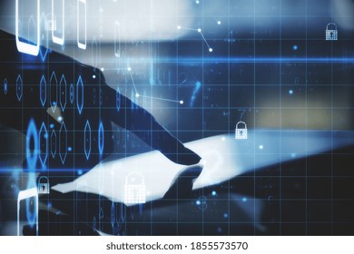 Hand using tablet computer with digital padlock interface and  binary code. Protection and web safety concept