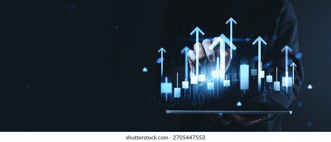 Hand using tablet with glowing chart bars and arrows rising on dark background, digital style, symbolizing business growth and financial success concept